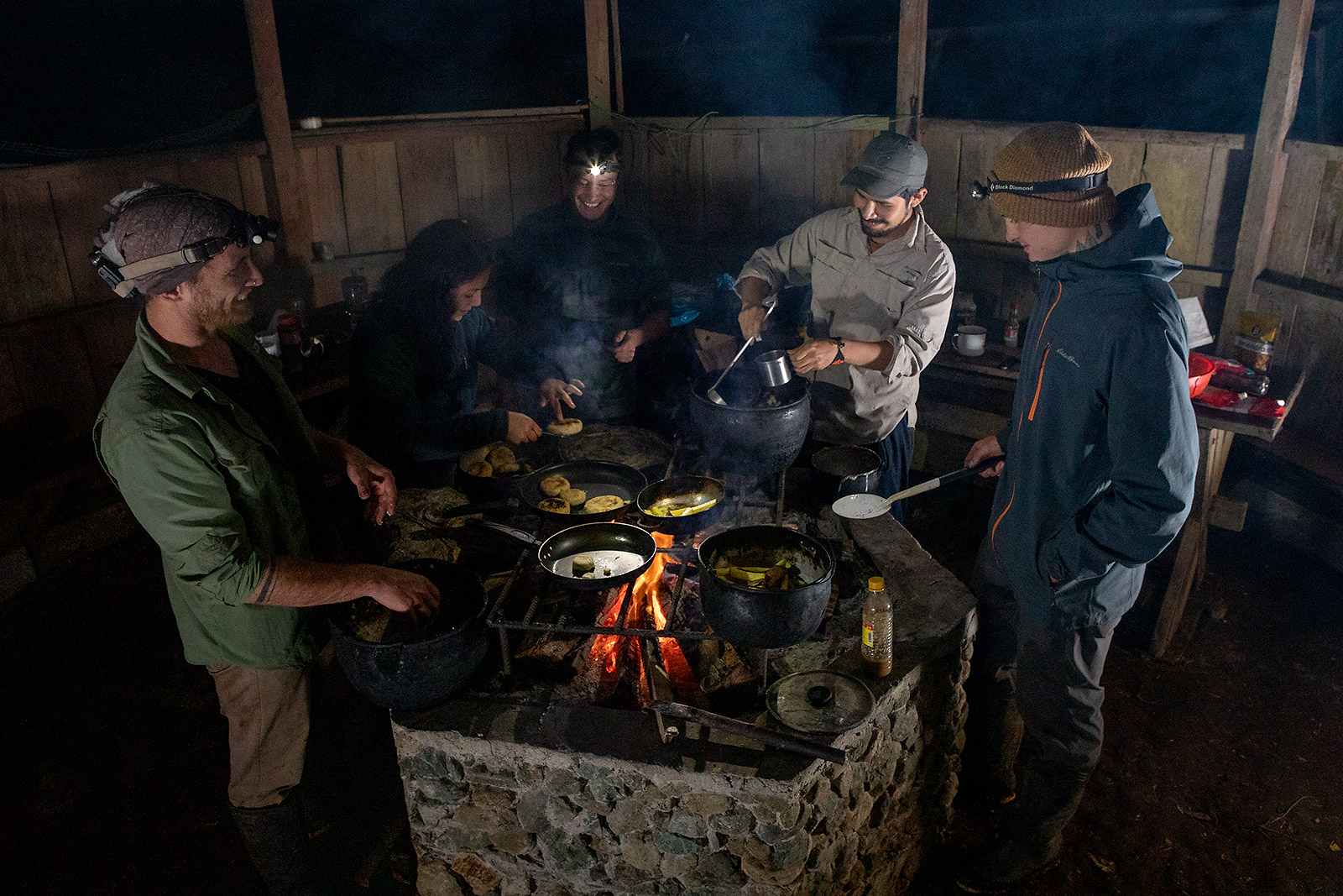 Research team congregated around the fireplace